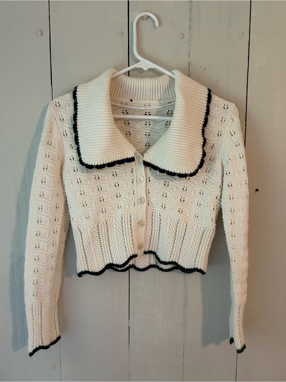 Cream Knit Button-Up Cardigan with Black Trim